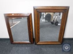 A pair of antique mahogany framed mirrors