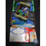 Three boxes of Tomy Thomas the Tank Engine rolling stock and accessories