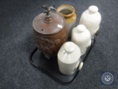 An early 20th century glazed pottery flagon together with a pottery storage jar and three vintage
