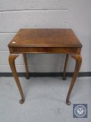 A walnut occasional table