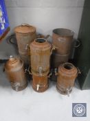 Five metal water urns (three missing lids)