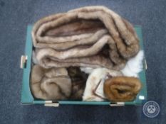 A box of five assorted fur hats,