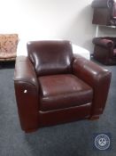 A brown leather armchair