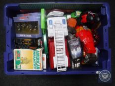 A box of assorted toys - die cast and Airfix surges, die cast vehicles,