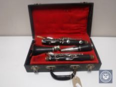 A cased four piece clarinet