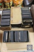 A tray of four boxes of antique glass negatives