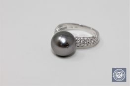 A 14ct white gold silver pearl ring,
