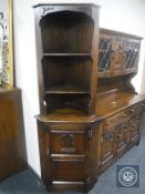 An oak Webber Furniture corner cabinet