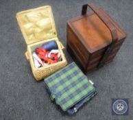 An Oriental carved wooden work box together with two 20th century sewing boxes with contents