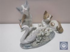 Two Lladro cat figures,