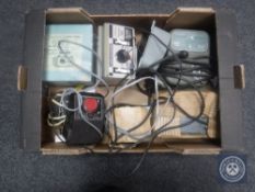 A box of seven vintage model railway power control units