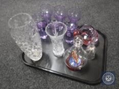 A tray of six purple studio glass wine glasses together with two crystal vases,
