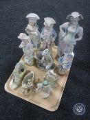 A tray of ten continental bisque figures and figural vases