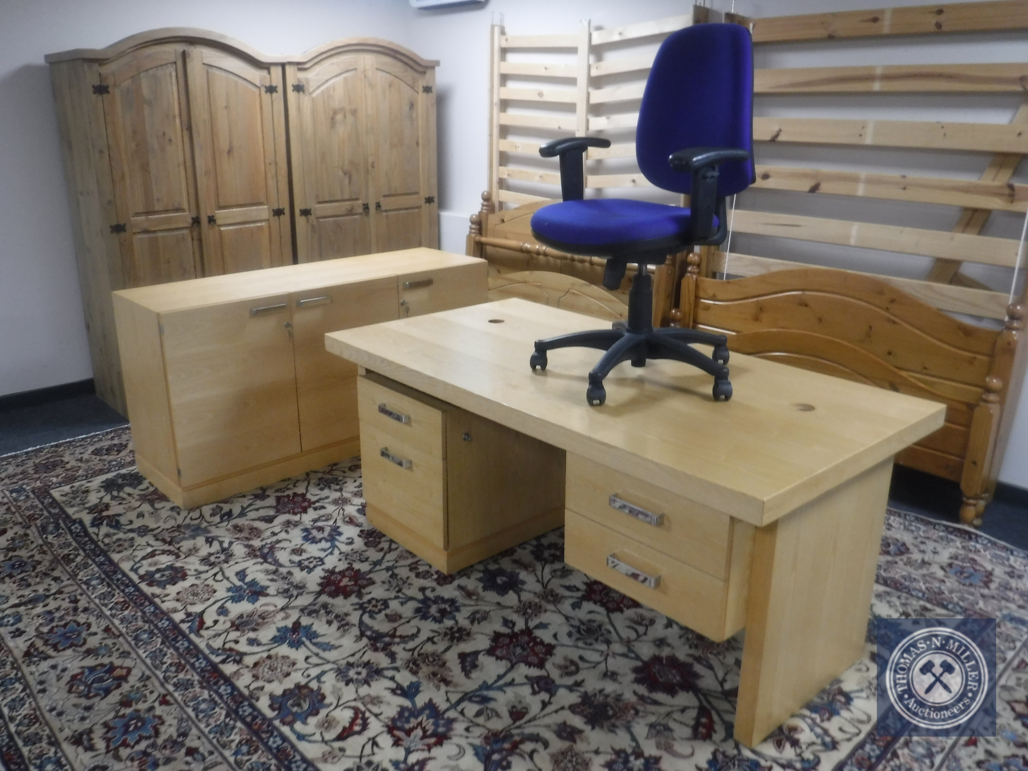 A suite of office furniture : desk fitted two drawers, under desk filing chest,