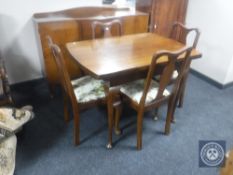 A six-piece 20th century walnut Queen Anne style dining room suite