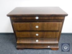 A late 19th century continental mahogany four drawer chest