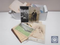 A box of antiquarian postcards