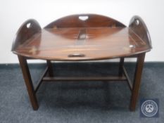 A mahogany butler's tray on stand CONDITION REPORT: 90cm long by 60cm wide by 70cm