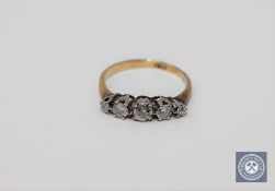 An 18ct gold five stone diamond ring.