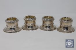 A superb set of four large Georgian silver gilt salts, London marks, Thomas Ross 1820,