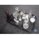 A tray of glass ware, paperweights, hand bells,