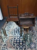 A child's high chair together with another child's chair, counter top cigar cabinet,