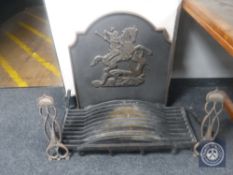 An antique cast iron fire grate and back depicting St George & The Dragon plus a pair of Art