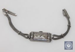 A lady's platinum diamond set cocktail watch CONDITION REPORT: Fully wound and not