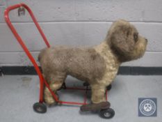 A 20th century push-along dog by Lines Brothers of Ireland