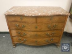 A 19th century marble topped serpentine fronted five drawer chest,