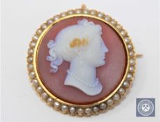 A good quality Victorian stone cameo and pearl brooch, diameter 34 mm.