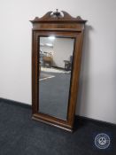 An antique mahogany hall mirror