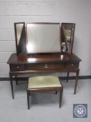 A Stag Minstrel dressing table with triple mirror and stool