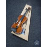 A boxed Stentor student violin and bow