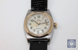 A gents vintage stainless steel and gold Rolex Oyster Perpetual 'bubbleback' wristwatch