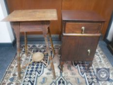 An Edwardian oak occasional table together with a bedside cabinet