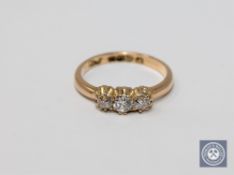 A Victorian 18ct gold diamond three stone ring.