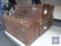 Five leather luggage cases