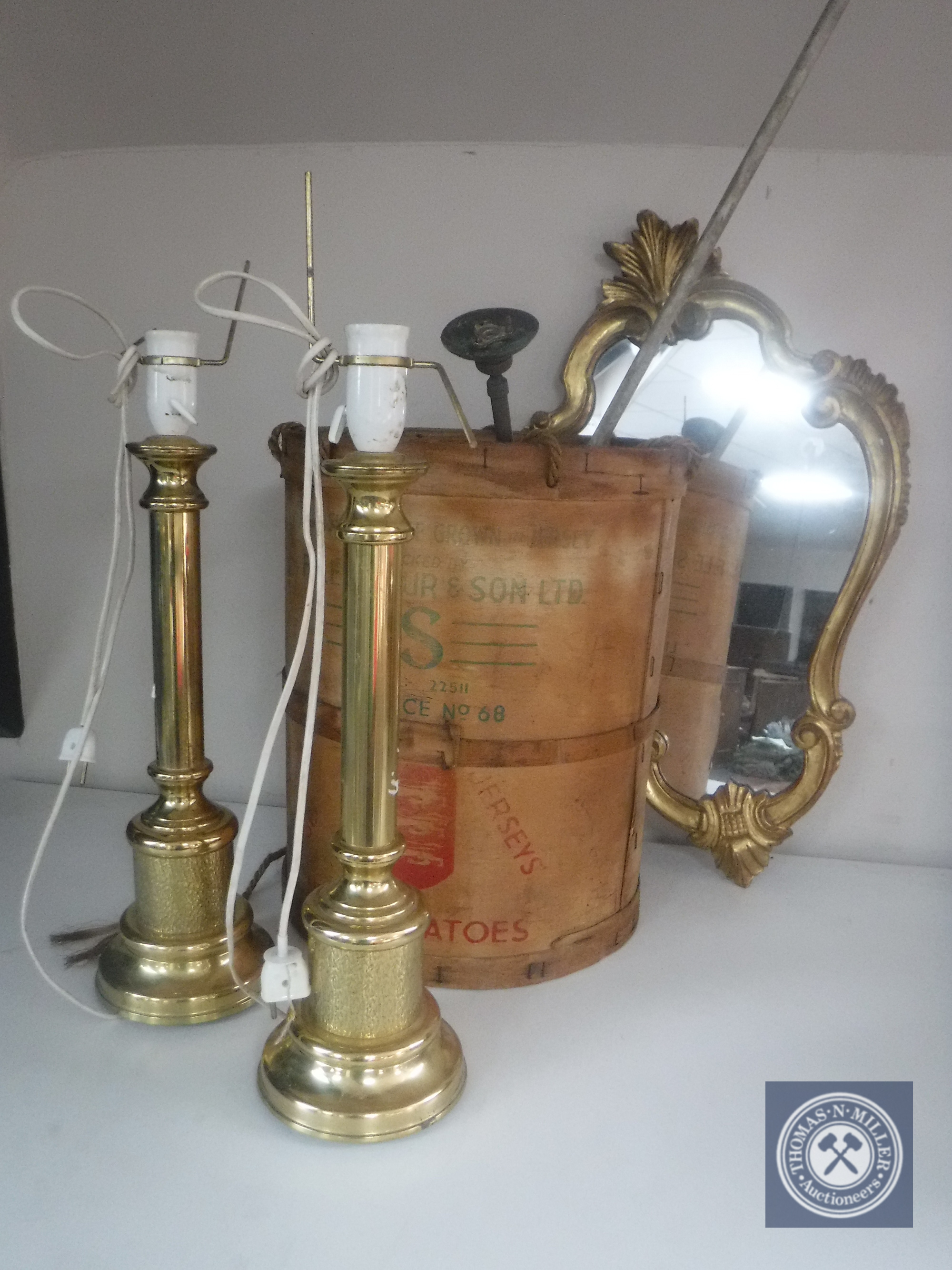 A box of brass table lamps, mahogany framed mirror,