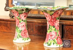 A rare very large pair of Wemyss vases decorated with cabbage rose sprays,