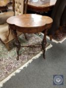 A Victorian figured walnut work table,