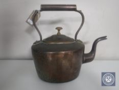 A Victorian copper kettle