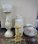 A West German cream pottery vase together with a Limoges wash jug and basin decorated with pink