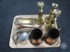 A tray of two antique copper tankards, brass miniature powder flask,
