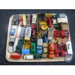 A tray of vintage play-worn die cast vehicles including Dinky Toys forklift truck, moto cart,