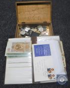 A wooden box containing various coins, Victorian mounted crown,