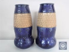 A pair of Royal Doulton glazed pottery vases,