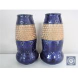 A pair of Royal Doulton glazed pottery vases,