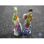 A pair of early 20th century Chinese figures, height 16 cm.