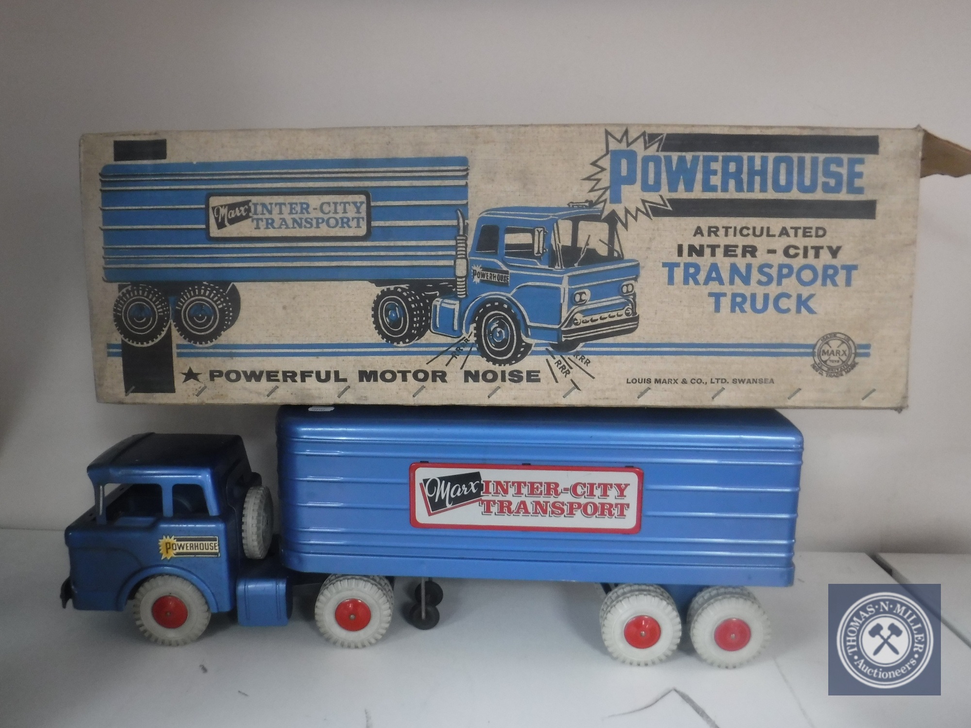A mid 20th century boxed Powerhouse articulated Intercity transport truck